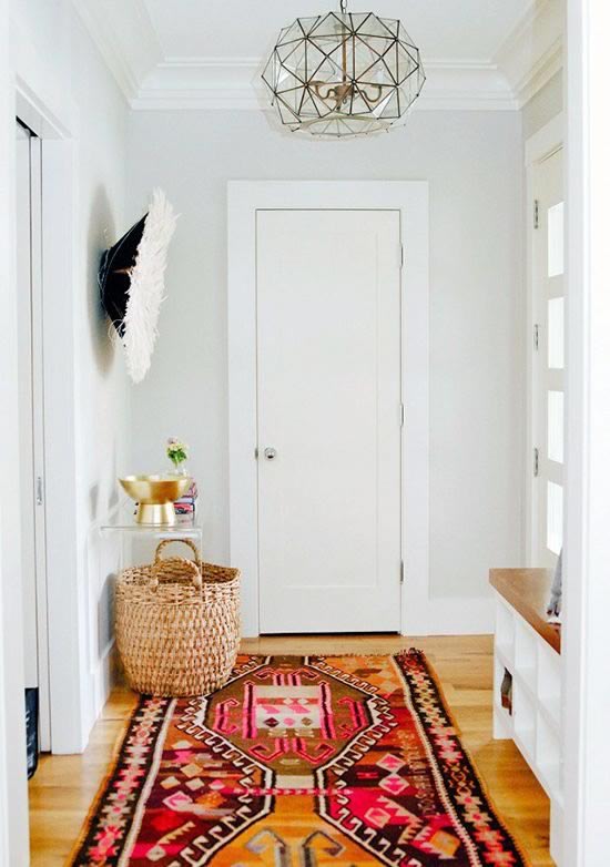 Coloca una alfombra de alta calidad en la entrada de la casa